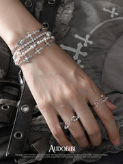 Winged Grace Angel Tears Openwork Wing Ring, shown worn by a model.