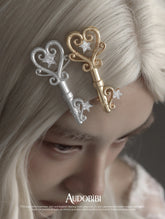 Winged Grace Key Hair Clip, shown worn by a model.