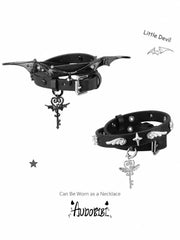 Angel and Devil leather straps with winged hardware, shown worn as bracelets.