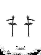 Black bat-wing drop earrings on a white background.
