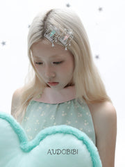 Lily Dream Garden Window & Heart Hair Clip, shown worn by a model.