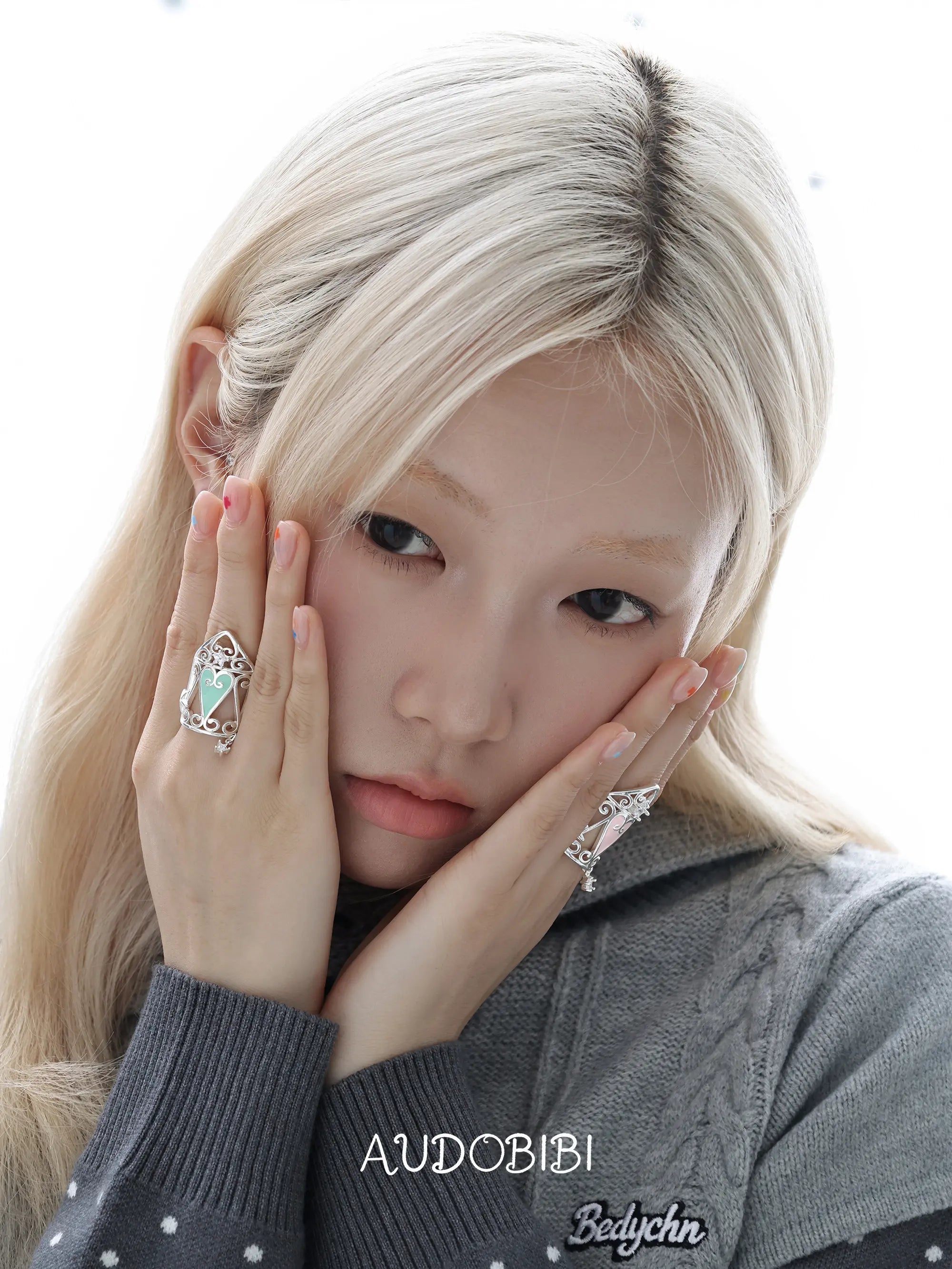 Lily Hidden Garden Zircon Window & Heart Ring, shown worn by a model.