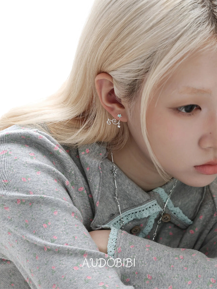 Lily Starvine Detachable Star Stud Earrings, shown worn by a model.