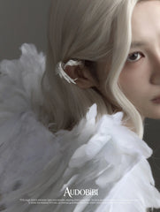 Winged Grace Judgment Angel Long Wing Ear Cuff, shown worn by a model.