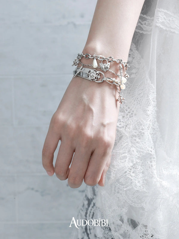Chivalry Platinum-Plated Light Luxury Iris Armor Pearl Bracelet Bangle™