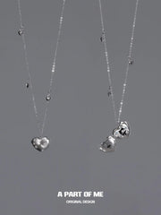สร้อยคอจี้รูปเกล็ดหิมะและแมวชุบแพลตตินัม 18K Hello Winter Meow™