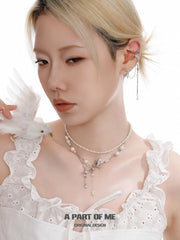 윙드 그레이스 18K 플래티넘 도금 태슬 천연 진주 초커 목걸이™
