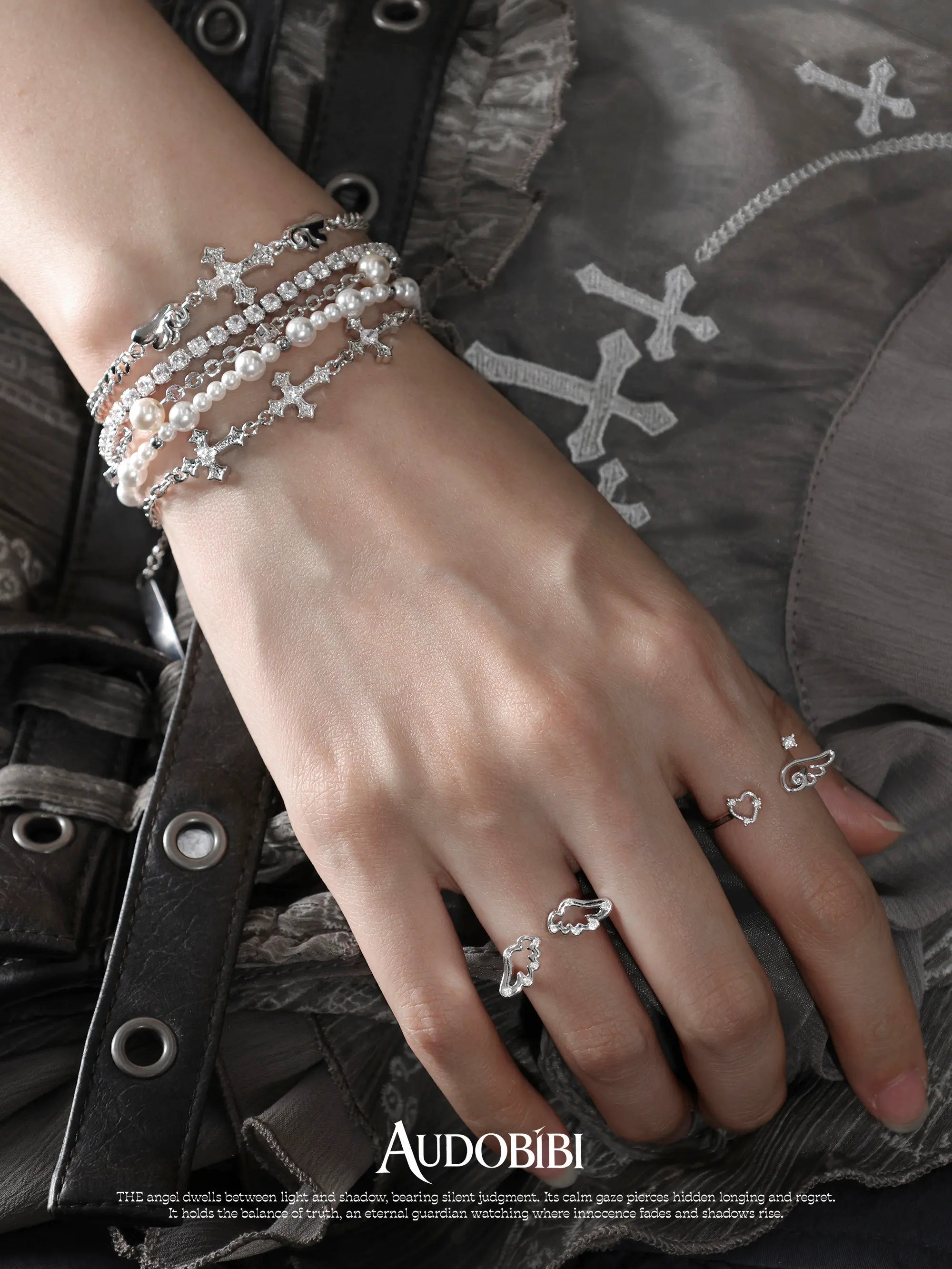 Winged Grace Judgment Angel Layered Bead Bracelet, shown worn by a model.