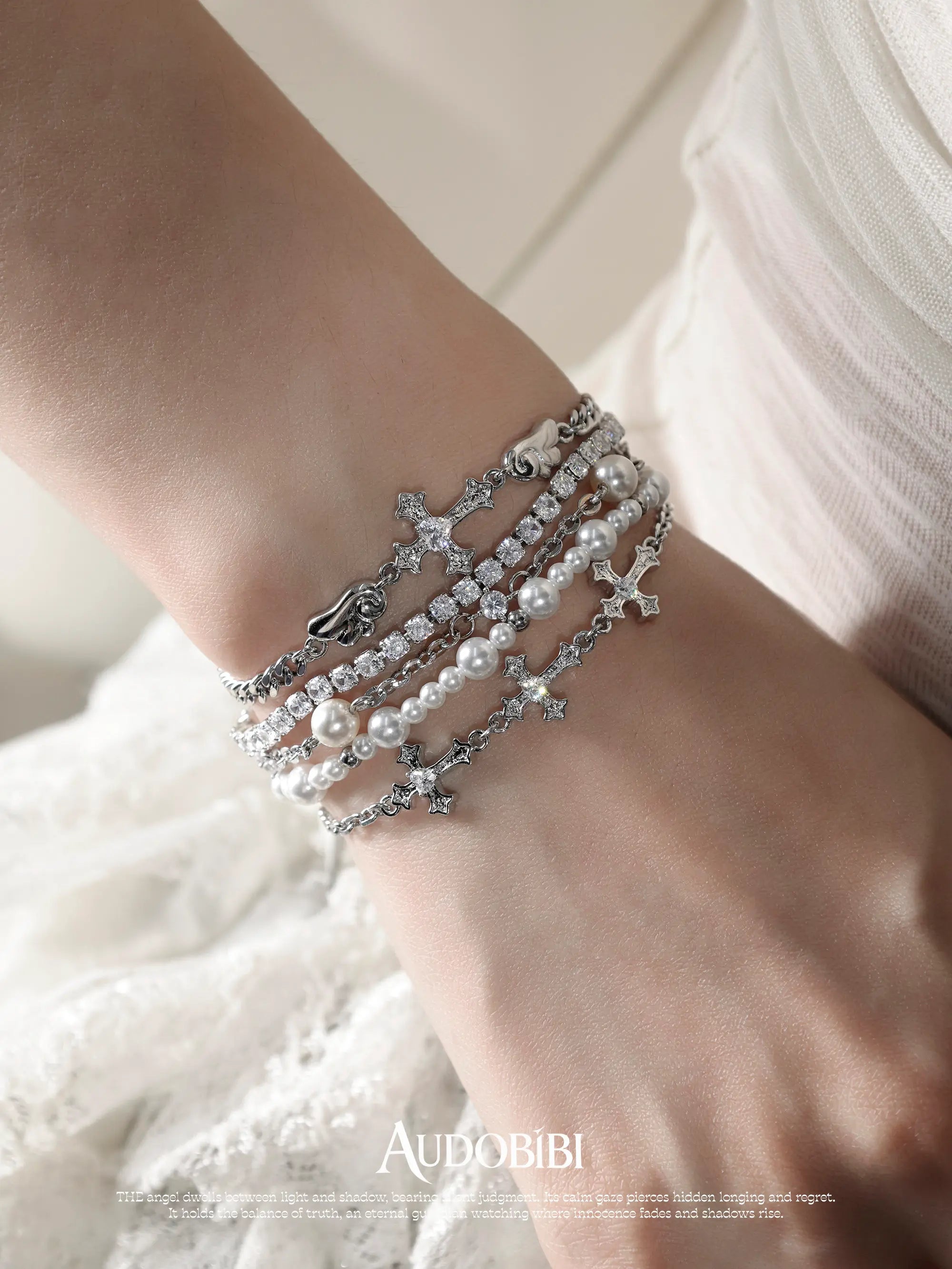 Winged Grace Judgment Angel Layered Bead Bracelet, shown worn by a model.