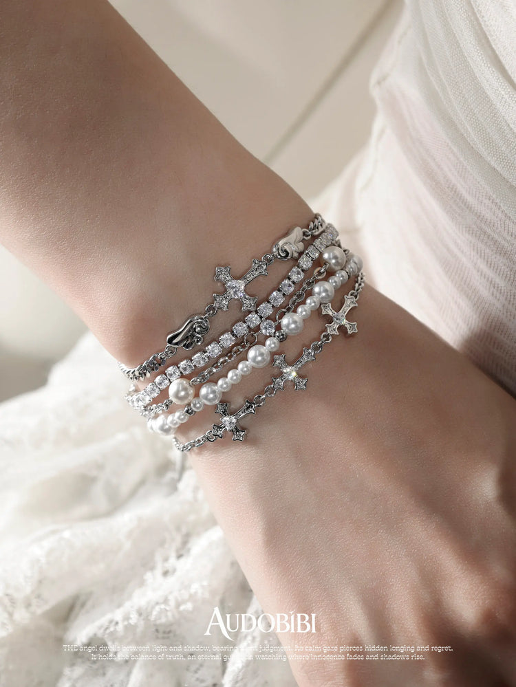 Winged Grace Judgment Angel Layered Bead Bracelet, shown worn by a model.