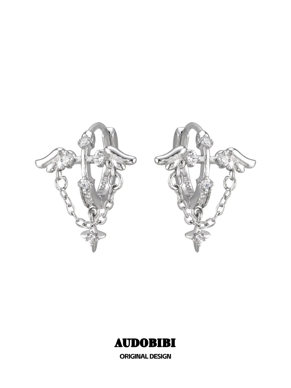 Wing hoop earrings with draped chains and hanging star details.