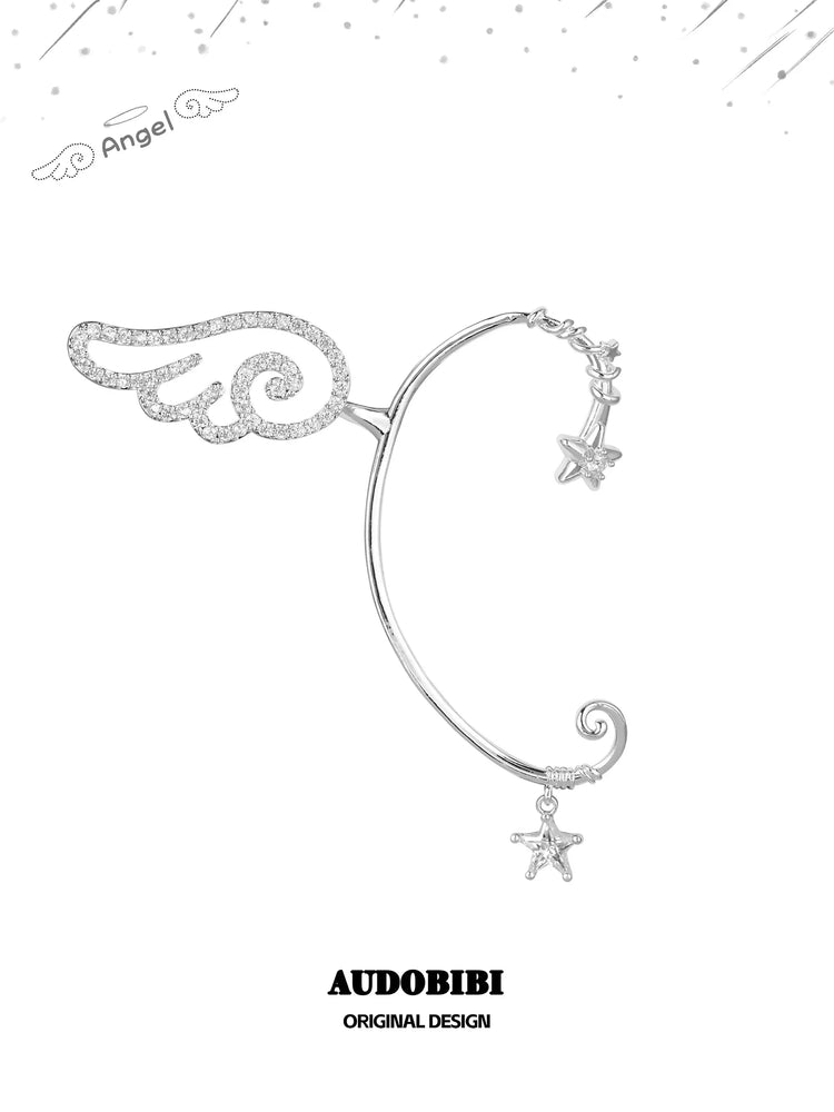 Winged Grace Judgment Angel Sparkling Wing Ear Cuff, shown on a white background.