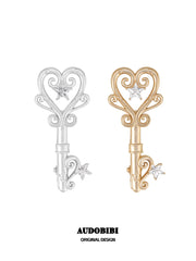 Winged Grace Key Hair Clip, shown on a white background.