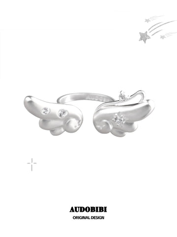 Winged Grace Dreamcore Angel Floating Wing Ring, shown on a white background.