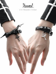 Angel and Devil leather straps with winged hardware, shown worn as bracelets.