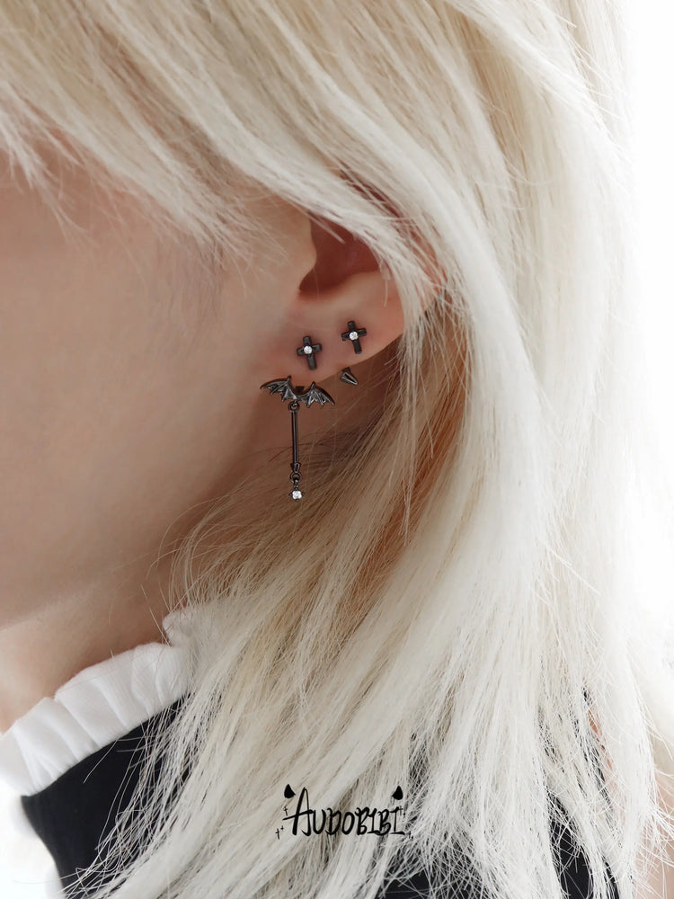 Little Devil Detachable Bat-Wing Drop Earrings, shown worn by a model.