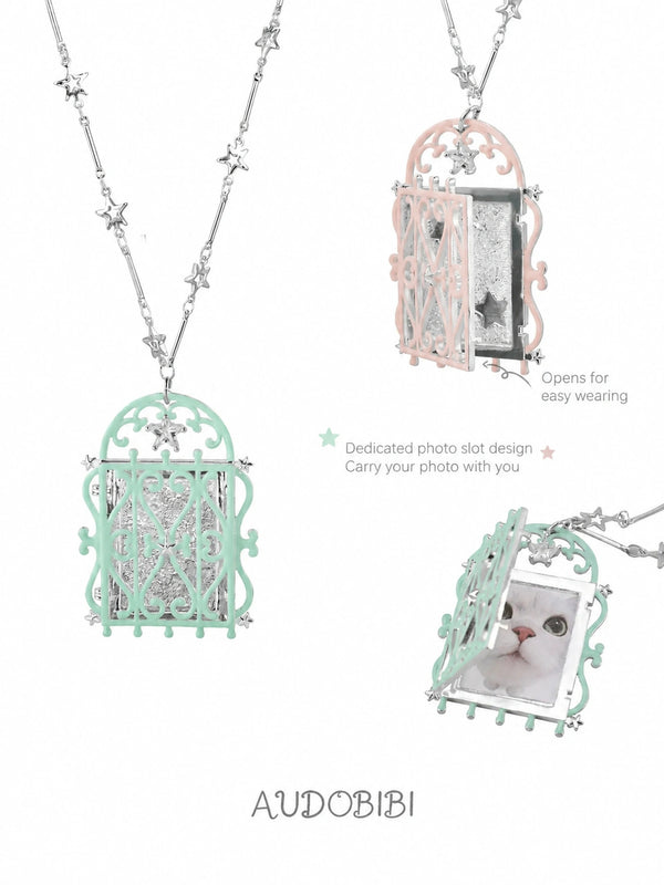 Window-shaped photo locket necklace, shown on the hand or wrist with other jewelry.