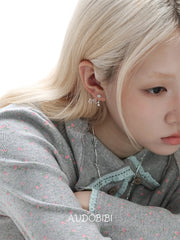 Lily Starvine Detachable Star Stud Earrings, shown worn by a model.