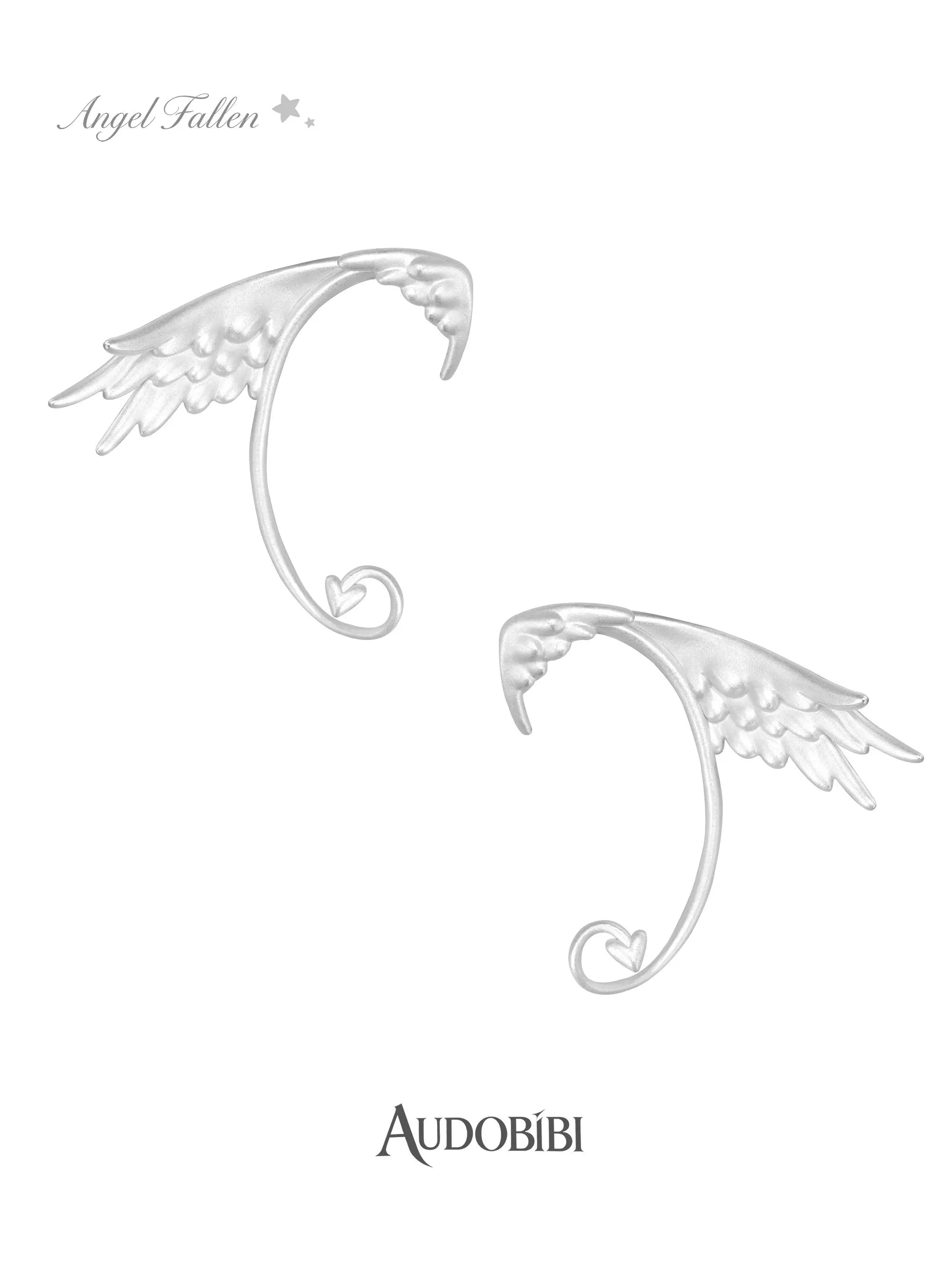 Pair of wing ear cuffs showing the wing shapes and curved supports.