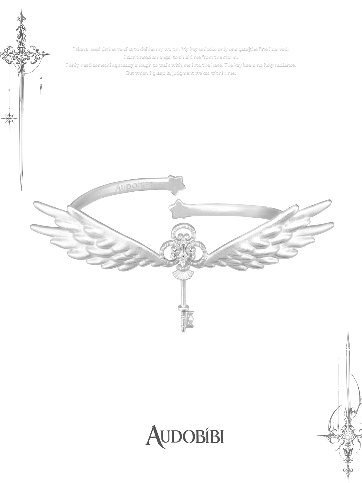 Wing arm cuff with a hanging key detail on a white background.
